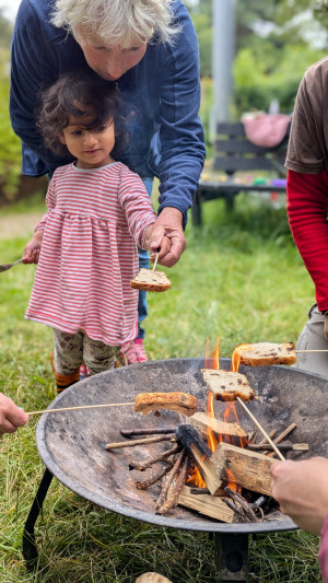 24 07 12 Nature Tots Child toasting toast